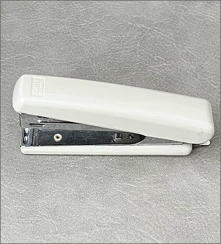 The side view photo of stapler, but took from a higher position